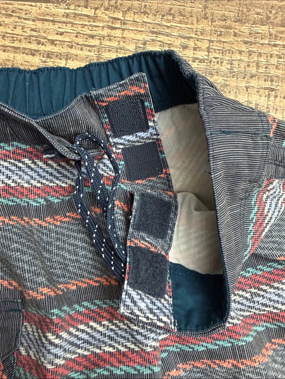 Billabong Kids Gray Swim Trunks with Red and Teal Stripes